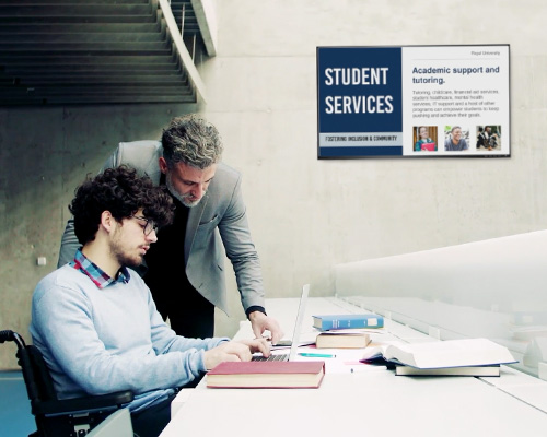 Student services message showing up on wall signage powered by a multi-use device.